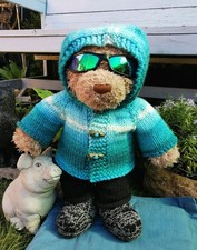 Hand knitted teddy bear