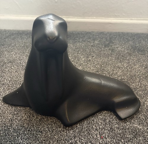 Large black pottery walrus - black,