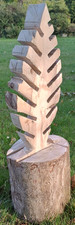 Wooden feather sculpture