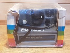 A Vintage Polaroid The Button