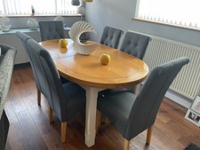 oak table and six chairs