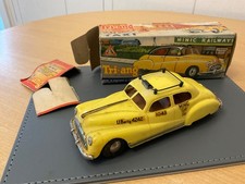 1950’S TRI-ANG MINIC CLOCKWORK TAXI CAB CAR. BOXED