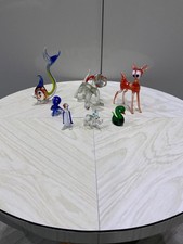 minature animal figurines hand