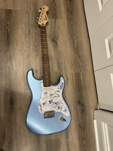 Guitar signed all the - by,