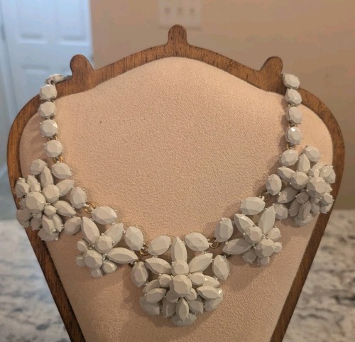 Crew signed white floral bib - signed,