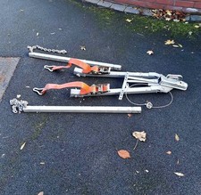 car towing a frame recovery transport