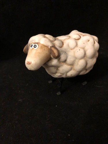 Small sheep ceramic figurine