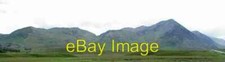 Photo 6x4 Grazing land with