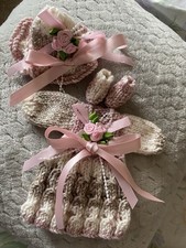 Hand Knitted dolls clothes to