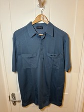 Tom Hagan blue golf polo shirt