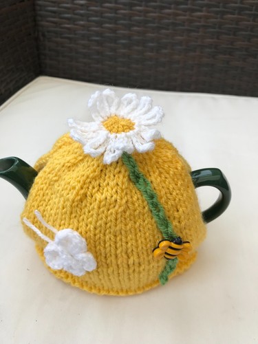 Hand knitted daisy tea - knitted,
