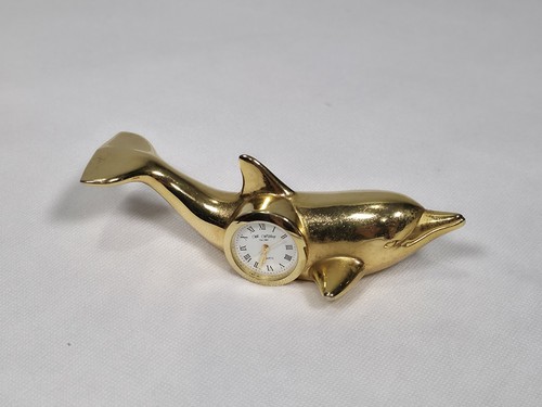 Vintage brass dolphin quartz - brass,