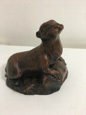 BROWN OTTER FIGURINE