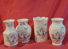 FOUR PRETTY VINTAGE BONE CHINA