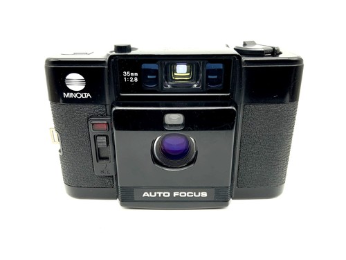 Minolta point shoot - &,