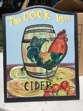 Funny pub sign “THE COCK IN