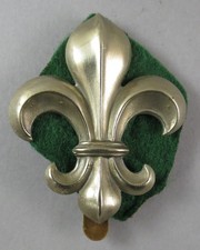 Military W/M Cap Badge The