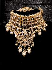 Asian/Indian kundan studded and pearl necklace set with earrings and tika