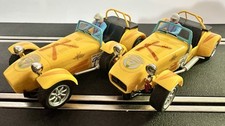 2 scalextric caterham 7 cars