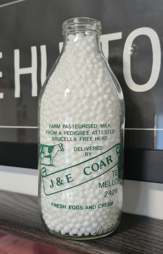 Vintage milk bottle j - milk,