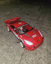 Nitro rc touring car 1/10 scale with celica body needs controller and overhaul e