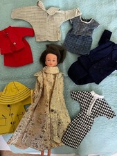1960's Tressy doll and  7