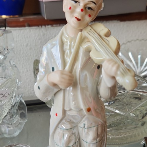 Porcelain clown playing - porcelain,