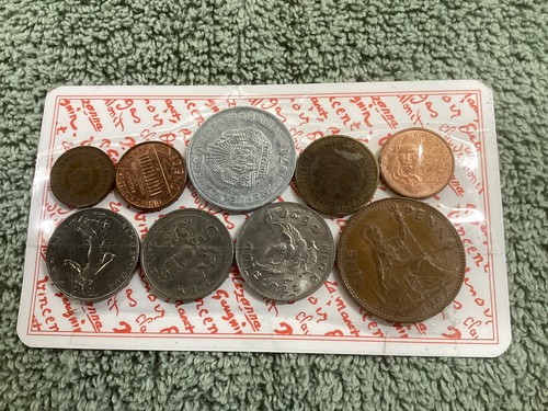 Foreign coins shown - foreign,