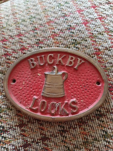 Cast iron brass plaque - cast,