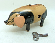 Wells Brimtoy tinplate toy pig