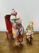 Enesco Clown On Pedicab And The boy on the tricycle