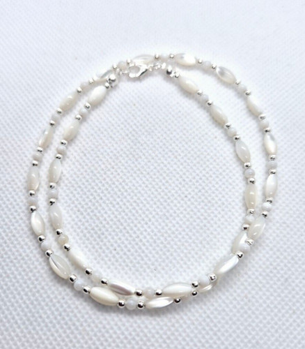 White oval shell - oval, beaded