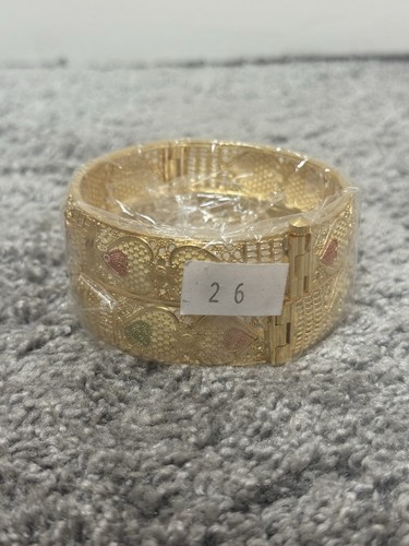 Thick gold designer bangles - designer,