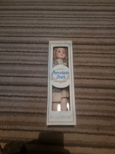 The classique porcelain doll - porcelain,
