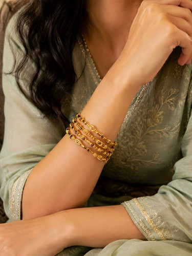 Gold tone metal round bangle - gold,