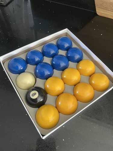 Blue and yellow pool balls - and,