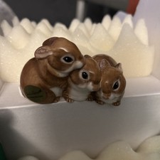 Hand-painted trio of bunnies