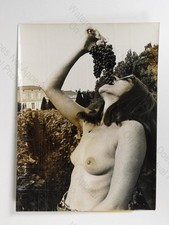 Topless Woman Eating Grapes
