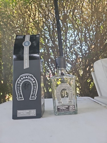 Empty tequila bottle - empty,
