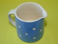 A TG Green Domino Milk Jug