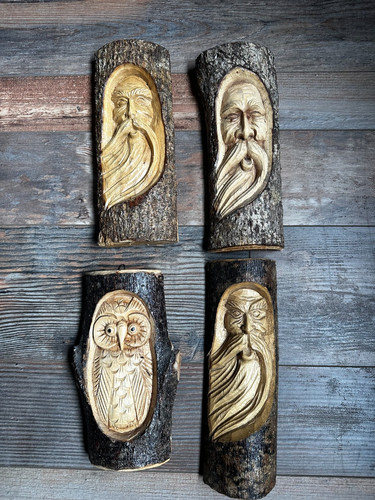 Green man log carvings - green,