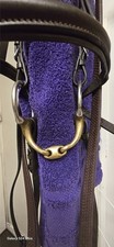 Lovely Brown cob leather bridle with reins Included and 5" snaffle bit. 