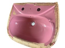 Bright pink wall hung basin