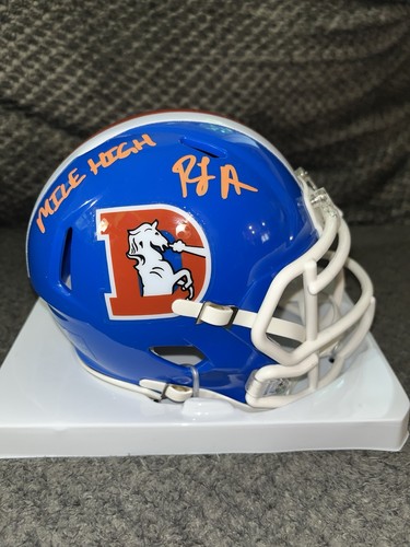 Harvey signed denver - rj,