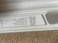 White Lascal Kiddyguard Avant Retractable Stair Gate for Toddlers and Babies.