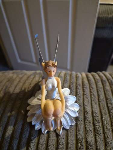 Sitting fairy with blue - fairy,