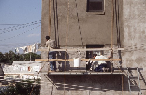 Men scaffolding building - scaffolding,