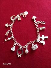 Beautiful 925 Silver Plated Charm Bracelet With 13 Charms