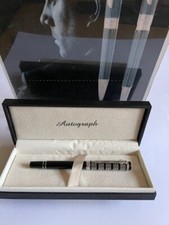 AUTOGRAPH BLACK AND SILVER