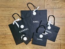Authentic Black Chanel paper Gift bags / shopping bag, with white Camellia